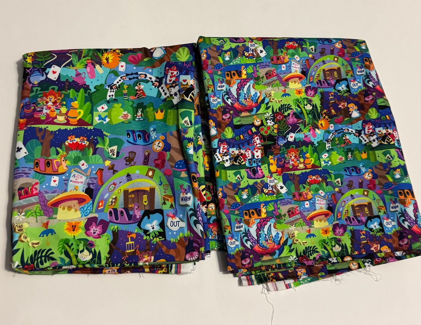 Wonderland Woods large and tiny scale woven fabric